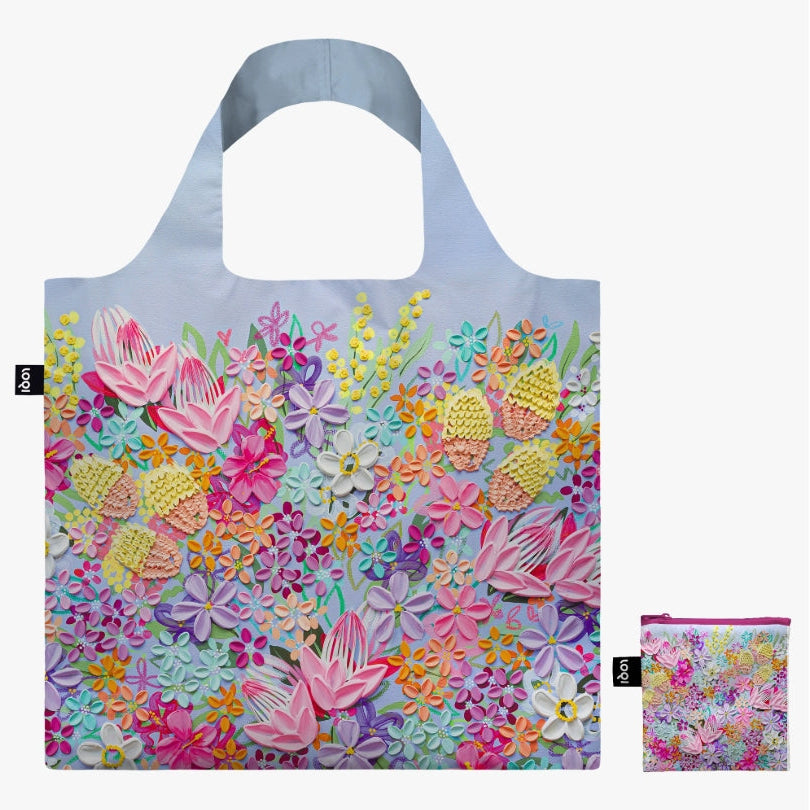 Floral-patterned reusable bag with matching pouch on a white background